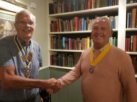 President Nigel Pullen invests President Elect David Nugent
